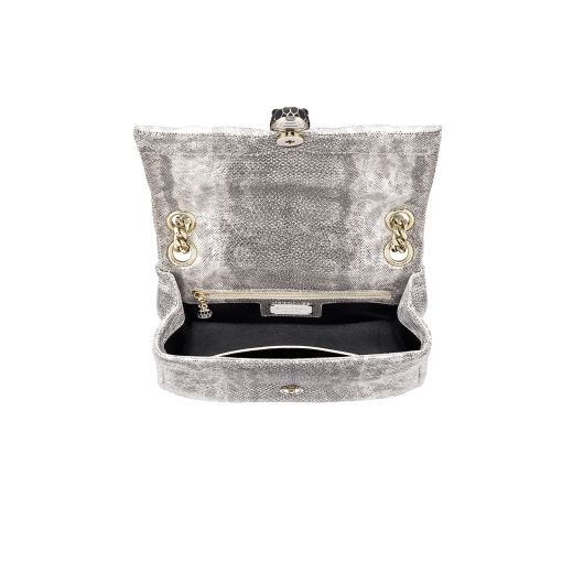 Serpenti Cabochon shoulder bag in soft matelassé charcoal diamond metallic karung skin with graphic motif. Snakehead closure in light gold plated brass decorated with matte black and glitter charcoal diamond enamel, and black onyx eyes. 981-MK image 4