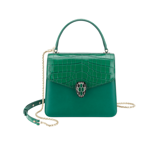 Serpenti Forever crossbody bag in sea star coral shiny croco skin and smooth calf leather. Snakehead closure in light gold plated brass decorated with black and white enamel, and green malachite eyes. 752-CLCR image 1