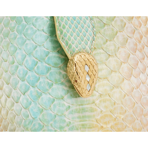 Serpenti Ellipse small crossbody bag in multicolour Spring Shade python skin with sunbeam citrine yellow nappa leather lining. Captivating snakehead closure in gold-plated brass embellished with white mother-of-pearl scales and red enamel eyes. 291736 image 6