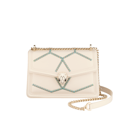 Serpenti Diamond Blast small shoulder bag in ivory opal calf leather with twisted chain and leather décor, and Niagara sapphire blue nappa leather lining. Captivating snakehead closure in light gold-plated brass embellished with matt and shiny ivory opal enamel scales and black onyx eyes. 291725 image 1
