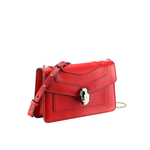 “Serpenti Forever ” crossbody bag in carmine jasper calf leather. Iconic snakehead closure in light gold plated brass enriched with black and white enamel and green malachite eyes 287020 image 2