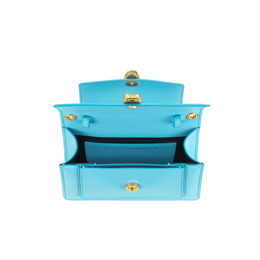 "Alexander Wang x Bvlgari" belt bag in smooth Aegean Topaz blue calf leather. New double Serpenti head closure in antique gold-plated brass with alluring red enamel eyes. Online Exclusive Colour. 291169 image 2