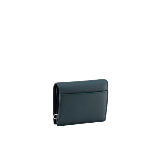 B.zero1 Man compact wallet with chain in black matt calf leather with niagara sapphire blue nappa leather interior. Iconic dark ruthenium and palladium-plated brass embellishment, and folded press-stud closure. BZM-COMPACTWALLET image 3