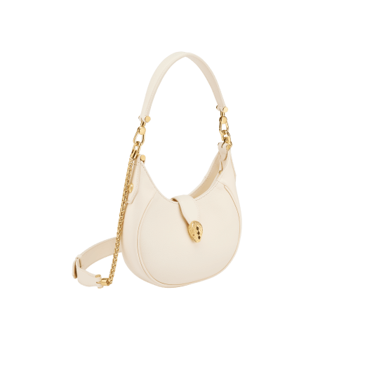 Serpenti Ellipse small crossbody bag in Urban grain and smooth flamingo quartz pink calf leather with flamingo quartz pink gros grain lining. Captivating snakehead closure in gold-plated brass embellished with black onyx scales and red enamel eyes. Online exclusive colour. 1204-Hobo image 2