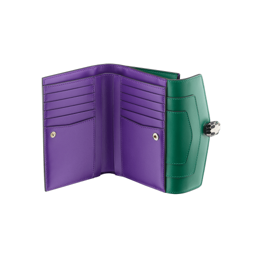 Serpenti Forever large wallet in emerald green calf leather with violet amethyst nappa leather interior. Captivating snakehead press button closure in light gold-plated brass embellished with black and white agate enamel scales and green malachite eyes. 291854 image 2