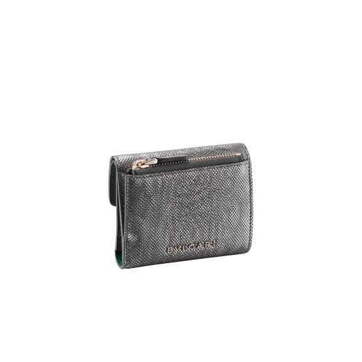 "Serpenti Forever" slim compact wallet in mint metallic karung skin and black calf leather. Iconic light gold plated brass snakehead stud closure in black and white agate enamel, with black onyx eyes. SEA-SLIMCOMPACT-MK image 3