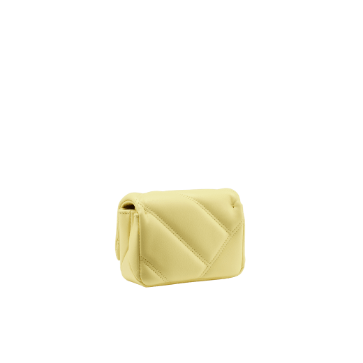 Serpenti Cabochon micro bag in ivory opal calf leather with a maxi matelassé pattern and black nappa leather lining. Captivating snakehead closure in gold-plated brass embellished with red enamel eyes. SCB-NANOCABOCHON image 3