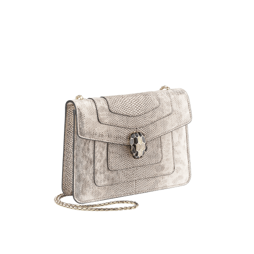 “Serpenti Forever” crossbody bag in multicolour "Shaded" karung skin with a pearled effect, and an Aquamarine light blue nappa leather internal lining. Tempting snakehead closure in palladium-plated brass, embellished with pearled lilac and matte Aquamarine light blue enamel, and black onyx eyes. 422-MK image 2
