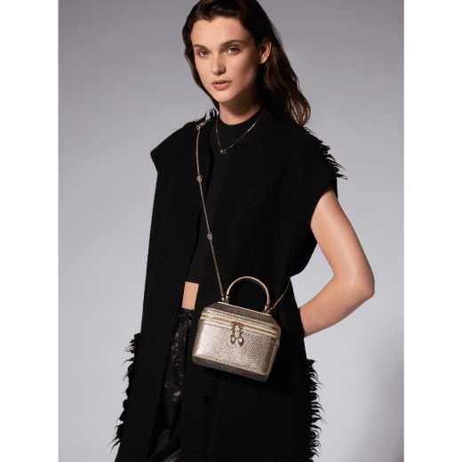 Serpenti Forever jewellery box bag in light gold Molten karung skin with black nappa leather lining. Captivating snakehead zip pullers and chain strap decors in light gold-plated brass. 1177-MoltK image 9