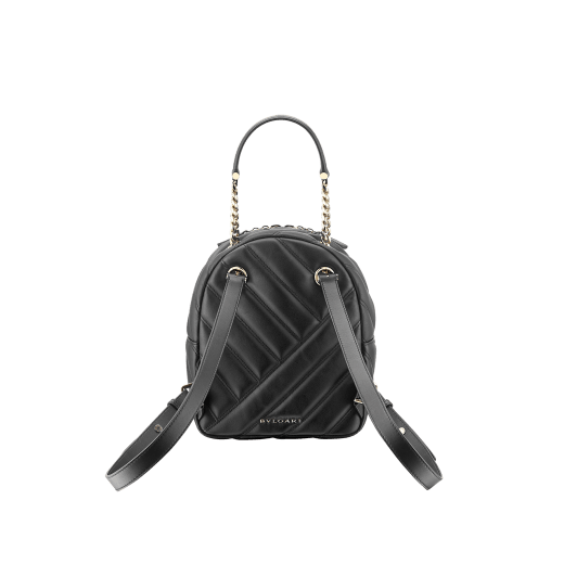 Serpenti Cabochon backpack in soft quilted white agate calf leather, with a graphic motif. Light gold plated brass tempting snake head closure in black and white agate enamel and black onyx eyes. 1009-NSM image 3