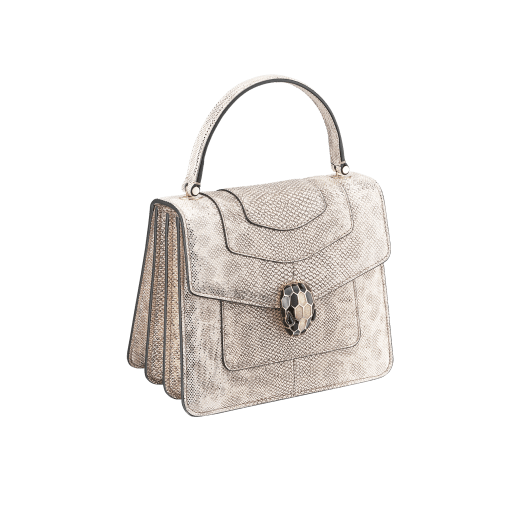 Serpenti Forever small top handle bag in white agate metallic karung skin with black nappa leather lining. Captivating snakehead closure in light gold-plated brass embellished with black and white agate enamel scales and black onyx eyes. 1122-MK image 2