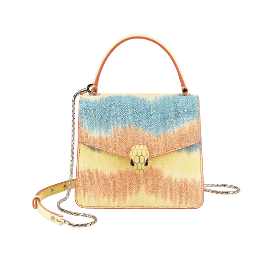 “Serpenti Forever ” crossbody bag in daisy topaz full galuchat skin body and daisy topaz calf leather sides. Iconic snakehead closure in light gold plated brass enriched with black and white enamel and black onyx eyes. 752-FG image 1