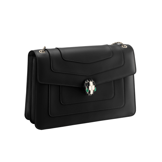 Serpenti Forever medium shoulder bag in black calf leather with emerald green grosgrain lining. Captivating snakehead closure in light gold-plated brass embellished with black and white agate enamel scales and green malachite eyes. 1089-Cla image 2