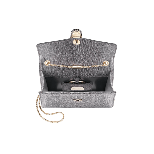 “Serpenti Forever” crossbody bag in multicolour "Shaded" karung skin with a pearled effect, and an Aquamarine light blue nappa leather internal lining. Tempting snakehead closure in palladium-plated brass, embellished with pearled lilac and matte Aquamarine light blue enamel, and black onyx eyes. 422-MK image 4