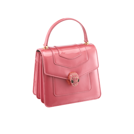 “Serpenti Forever” top handle bag in Blush Quartz pink calf leather with a varnished and pearled effect, and black gros grain internal lining. Tempting snakehead closure in gold plated brass, enriched with matte Blush Quartz pink enamel and black onyx eyes. 290943 image 2