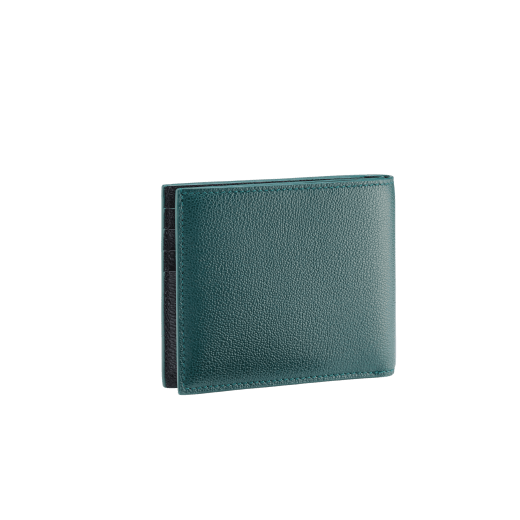 "BVLGARI BVLGARI" men's compact wallet in black and Forest Emerald green "Urban" grain calf leather. Iconic logo embellishment in dark ruthenium-plated brass with black enamelling. BBM-WLT2FASYM image 3