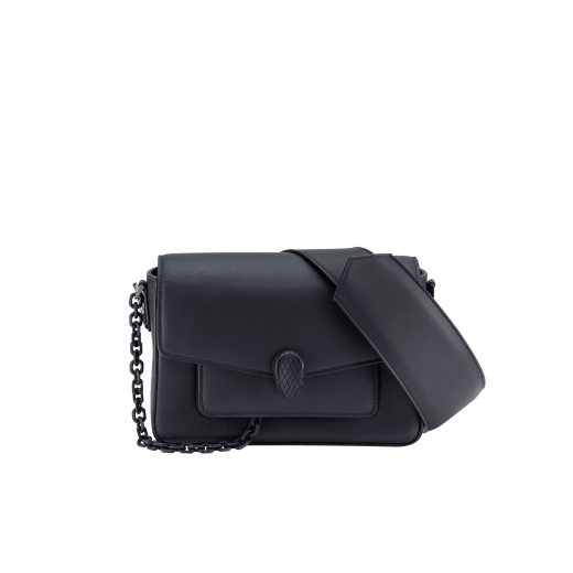 Serpenti Forever small unisex crossbody bag in matt black calf leather with black nappa leather lining and decorative chain enamelled in matt black. Captivating snakehead closure in dark ruthenium-plated brass enamelled in matt black and embellished with red enamel eyes. 291851 image 4