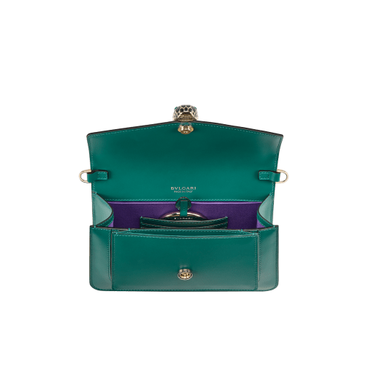Serpenti Forever East-West small shoulder bag in black calf leather with emerald green gros grain lining. Captivating snakehead magnetic closure in light gold-plated brass embellished with black and white agate enamel scales, and green malachite eyes. 1237-CL image 4