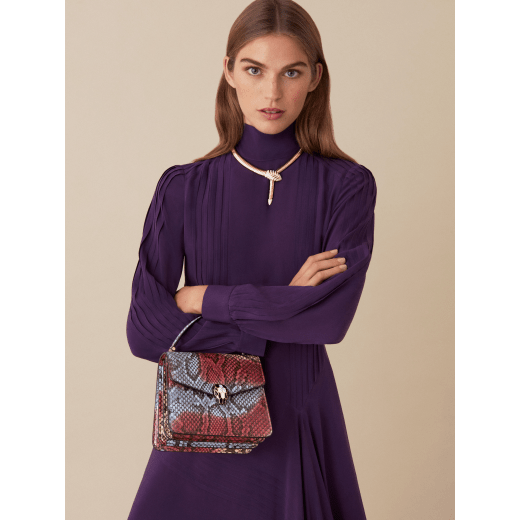 “Serpenti Forever ” top handle bag in multicolor "Chimera" python skin with Lavander Amethyst lilac nappa leather internal lining. Tempting snakehead closure in gold plated brass enriched with black and Lavander lilac enamel, and black onyx eyes 290579 image 3