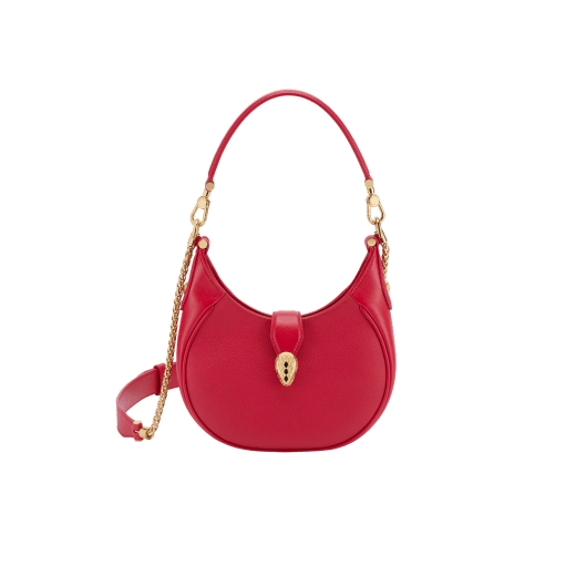 Serpenti Ellipse small crossbody bag in Urban grain and smooth flamingo quartz pink calf leather with flamingo quartz pink gros grain lining. Captivating snakehead closure in gold-plated brass embellished with black onyx scales and red enamel eyes. Online exclusive colour. 1204-Hobo image 1