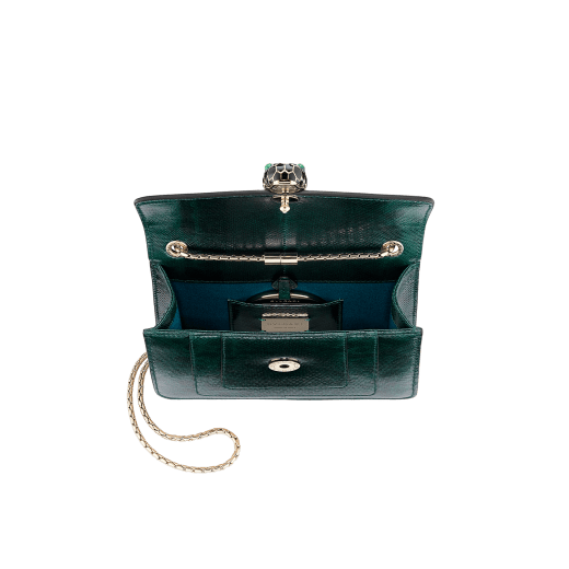 “Serpenti Forever” crossbody bag in shiny forest emerald karung skin. Iconic snakehead closure in light gold plated brass enriched with black and white enamel and green malachite eyes. 287357 image 3