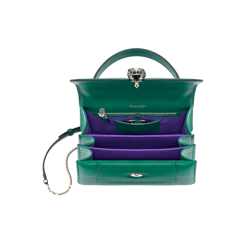 “Serpenti Forever” top handle bag in daisy topaz calf leather. Iconic snake head closure in light gold plated brass enriched with black and white enamel and green malachite eyes. 1050-CL image 3