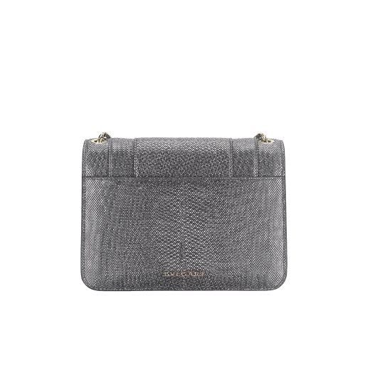 “Serpenti Forever” crossbody bag in charcoal diamond metallic karung skin. Iconic snakehead closure in light gold plated brass enriched with black and glitter hawk's eye enamel and black onyx eyes. 1082-MK image 3