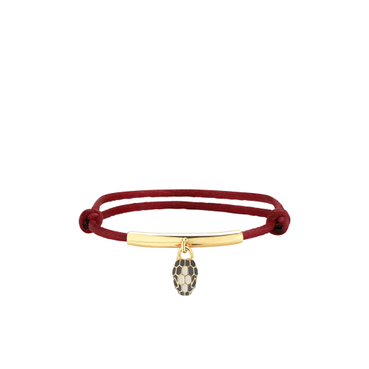 "Serpenti Forever" bracelet in ruby red fabric with a gold-plated brass plate. Iconic snakehead charm enamelled in black and white agate, with seductive black enamel eyes. SERP-MINISTRINGc image 1
