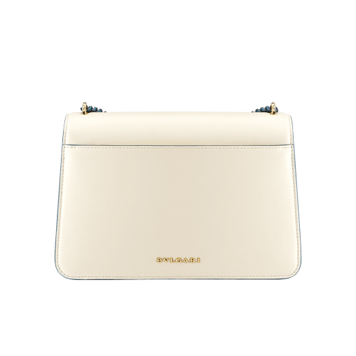 "Serpenti Forever" maxi chain crossbody bag in Ivory Opal white nappa leather, with an Deep Garnet bordeaux nappa leather internal lining. New Serpenti head closure in gold-plated brass, finished with small grey mother-of-pearl scales in the middle, and red enamel eyes. 1138-MCNb image 3