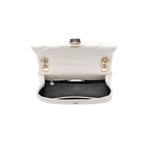 Serpenti Cabochon shoulder bag in soft matelassé white agate nappa leather with graphic motif and white agate calf leather. Snakehead closure in rose gold plated brass decorated with matte black and white enamel, and black onyx eyes. 981-NSM image 4