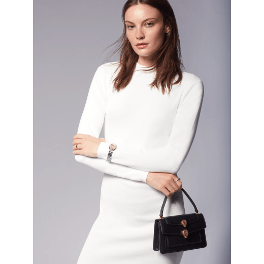 "Alexander Wang x Bvlgari" belt bag in smooth black calf leather. New double Serpenti head closure in antique gold-plated brass with tempting red enamel eyes. 288737 image 8