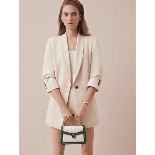 “Serpenti Diamond Blast” crossbody bag in white agate quilted nappa leather and emerald green smooth calf leather frames. Tempting snakehead closure in light gold-plated brass enriched with matte black and shiny emerald green enamel and black onyx eyes. 1063-FQDa image 5