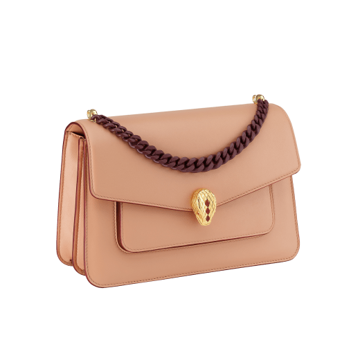 "Serpenti Forever" maxi chain crossbody bag in Ivory Opal white nappa leather, with an Deep Garnet bordeaux nappa leather internal lining. New Serpenti head closure in gold-plated brass, finished with small grey mother-of-pearl scales in the middle, and red enamel eyes. 1138-MCNb image 2