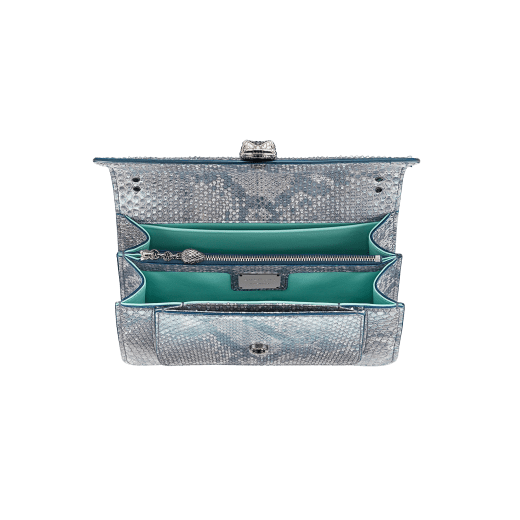 "Serpenti Forever" small maxi chain crossbody bag in Aquamarine light blue "Afterglow" python skin with a pearled effect, and an Aquamarine light blue nappa leather internal lining. New Serpenti head closure in dark ruthenium-plated brass, finished with small grey mother-of-pearl scales in the middle, and red enamel eyes. MCN-AP-A image 4