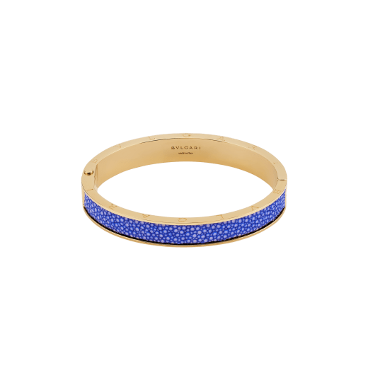 BULGARI BULGARI bangle bracelet in gold-plated brass with royal sapphire blue galuchat skin inserts. Iconic double BULGARI logo engraved on both edges and a hinge closure. HINGELOGOBRCLT-G-RS image 1