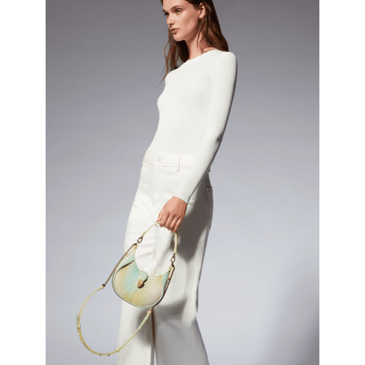 Serpenti Ellipse small crossbody bag in multicolour Spring Shade python skin with sunbeam citrine yellow nappa leather lining. Captivating snakehead closure in gold-plated brass embellished with white mother-of-pearl scales and red enamel eyes. 291736 image 8