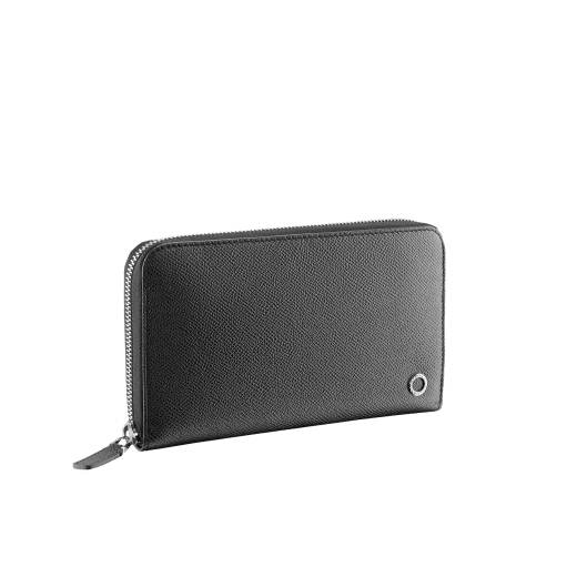 Zipped Wallet in denim sapphire grain calf leather and with bordeaux nappa lining. Brass palladium plated hardware and iconic BVLGARI BVLGARI motif. BBM-WLT-M-3G-12C image 1