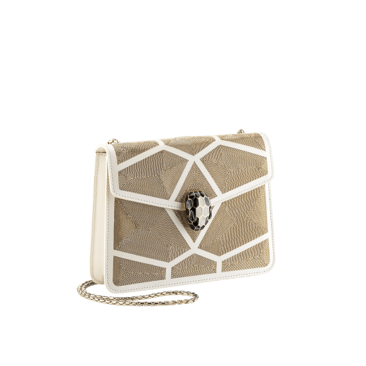 “Serpenti Forever” crossbody bag in black calf leather with a Million Chain motif. Iconic snake head closure in light gold plated brass enriched with black enamel and black onyx eyes. 422-CP image 2