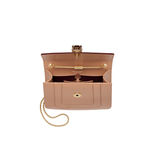 “Serpenti Forever” crossbody bag in Caramel Topaz beige calf leather finished with Deep Garnet bordeuax edges, and Beet Amethyst purple gros grain internal lining. Tempting snakehead closure in light gold plated brass, enriched with Deep Garnet bordeaux and Caramel Topaz beige enamel and black onyx eyes. 290926 image 4