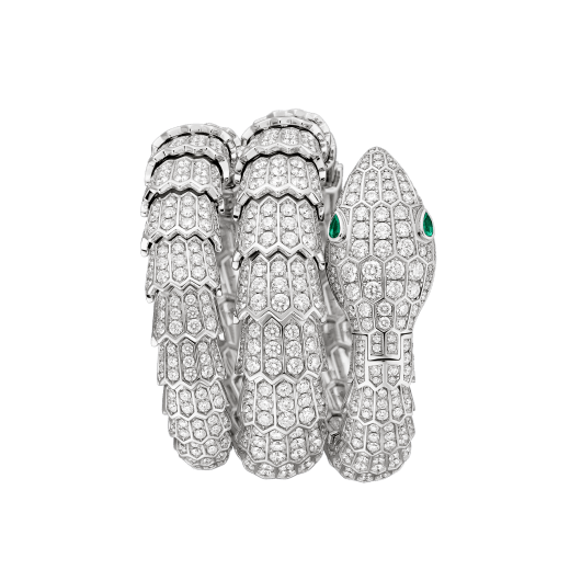 Serpenti Secret Watch with 18 kt white gold head, dial and double spiral bracelet, all set with brilliant cut diamonds, emerald eyes and 18 kt white gold case. 102701 image 1