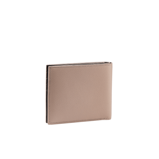 "BVLGARI BVLGARI" men's compact wallet in black and Forest Emerald green "Urban" grain calf leather. Iconic logo embellishment in dark ruthenium-plated brass with black enamelling. BBM-WLT2FASYM image 3