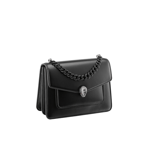"Serpenti Forever" small maxi chain crossbody bag in black nappa leather, with black nappa leather inner lining. New Serpenti head closure in dark ruthenium-plated brass and finished with small black onyx scales in the middle and red enamel eyes. 1134-MCNb image 2