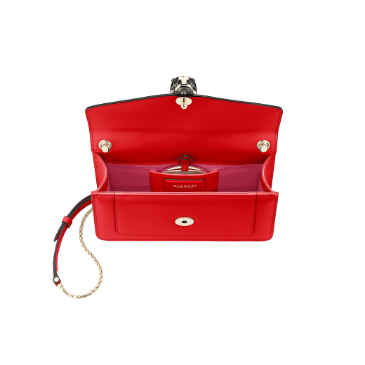 “Serpenti Forever ” crossbody bag in carmine jasper calf leather. Iconic snakehead closure in light gold plated brass enriched with black and white enamel and green malachite eyes 287020 image 4