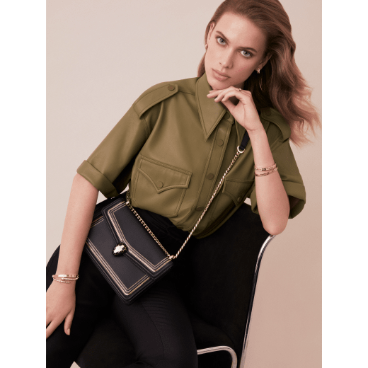 “Serpenti Diamond Blast” shoulder bag in black smooth calf leather, featuring a 3-Chain motif in light gold and palladium finishing. Iconic snakehead closure in light gold plated brass enriched with black and white enamel and black onyx eyes 922-3CFCL image 5