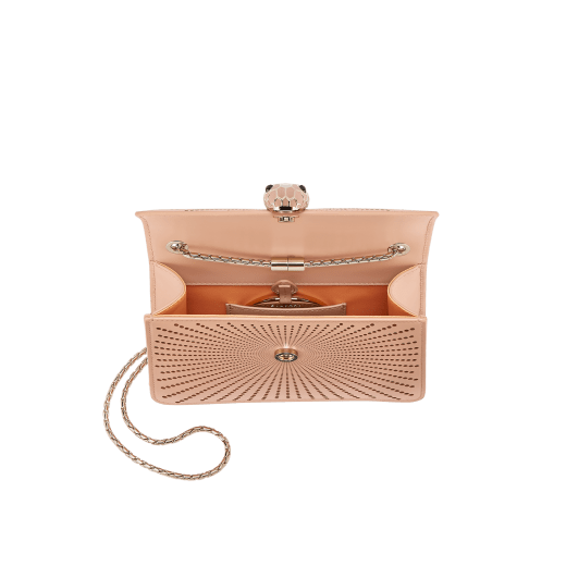 Serpenti Forever crossbody bag in ivory opal laser-cut calf leather with caramel topaz beige nappa leather lining. Captivating snakehead closure in light gold-plated brass embellished with matt and shiny ivory opal enamel scales and black onyx eyes. 422-LCL image 4