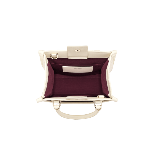 "Bvlgari Logo" small tote bag in Ivory Opal white canvas, with Beet Amethyst purple grosgrain inner lining. Bvlgari logo featured with light gold-plated brass chain inserts on the Ivory Opal white calf leather. BVL-1159-CC image 4