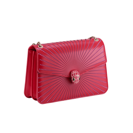 Serpenti Forever medium shoulder bag in amaranth garnet red laser-cut calf leather with taffy quartz pink nappa leather lining. Captivating snakehead closure in light gold-plated brass embellished with matt and shiny amaranth garnet red enamel scales and black onyx eyes. 1205-LCCL image 2
