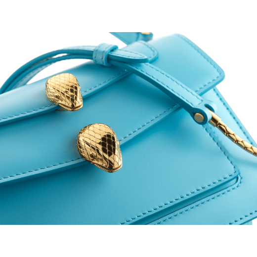 "Alexander Wang x Bvlgari" belt bag in smooth Aegean Topaz blue calf leather. New double Serpenti head closure in antique gold-plated brass with alluring red enamel eyes. Online Exclusive Colour. 291169 image 4