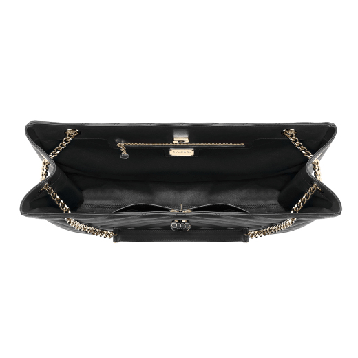 Serpenti Cabochon tote bag in soft matelassé black nappa leather with graphic motif and black calf leather. Snakehead decòr in rose gold plated brass embellished with matte black and shiny black enamel, and black onyx eyes. 990-NSM image 4