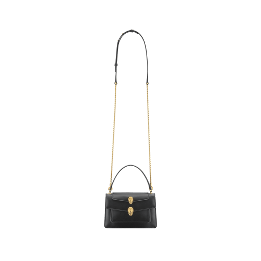 "Alexander Wang x Bvlgari" belt bag in smooth black calf leather. New double Serpenti head closure in antique gold-plated brass with tempting red enamel eyes. 288737 image 6
